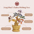Feng Shui 7 Chakra Wishing Tree with gold base and colorful crystals on a beige background.