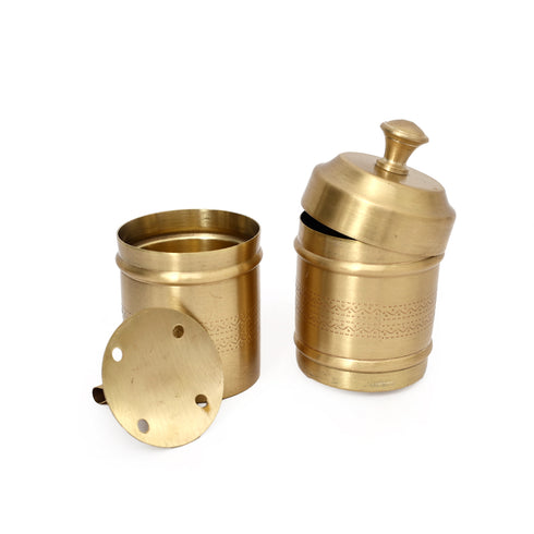 Brass container with lid and base on a white background