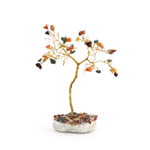 Decorative tree with multicolored stones on a white background