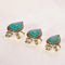 A set of three brass tortoise figurines with turquoise patterns on their shells, displayed against a white background.