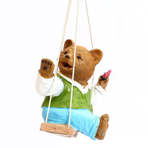 Adorable Hanging Teddy bear on a swing