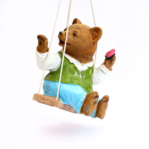 Adorable Hanging Teddy bear on a swing