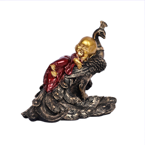 Decorative Showpiece of a Baby Buddha Peacefully Sleeping on a Peacock