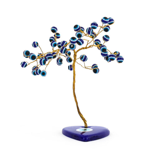 Decorative tree sculpture with blue and gold elements on a white background