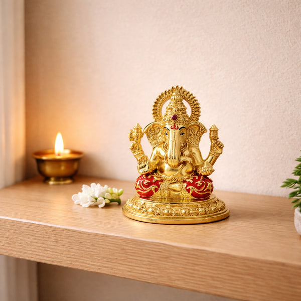 Gold-Coated Ganesha Figurine with Red Dhoti