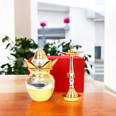 Gold and silver hookah set on a wooden table with a blurred indoor background