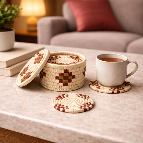 Woven coasters with a mug of tea on a marble surface in a cozy living room.