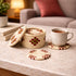 Woven coasters with a mug of tea on a marble surface in a cozy living room.