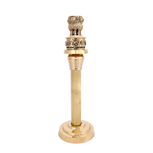 Close-up of Ashoka Chakra and lotus base detail on handcrafted brass Ashoka Pillar replica
