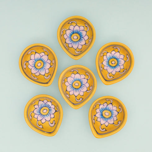 Handcrafted Yellow Leaf-Shaped Blue Pottery Diyas Set