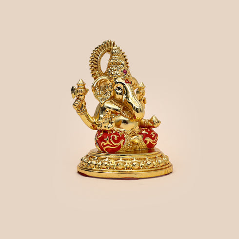 Gold-Coated Ganesha Figurine with Red Dhoti - Spiritual Home Décor