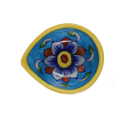 Hand-Painted Blue Pottery Diya with Floral Motif on Yellow Base