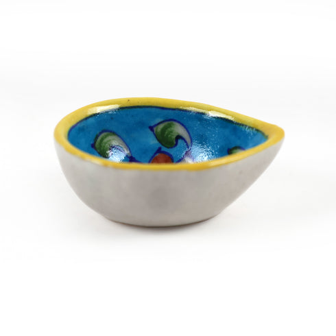 Hand-Painted Blue Pottery Diya with Floral Motif on Yellow Base