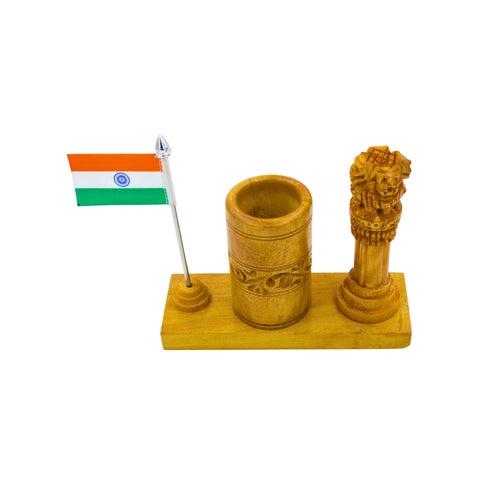 Close-up of Ashoka Pillar carving detail on wooden desk stand pen holder