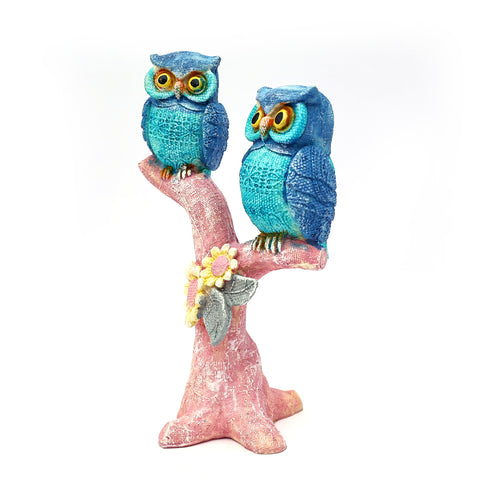 Owl Couple on a tree branch