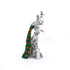 Silver-plated Peacock sitting on the branch
