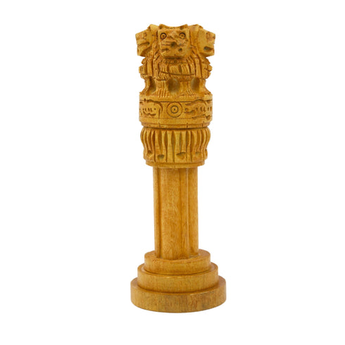 Close-up of carved lions and bell-shaped capital on wooden Ashoka Stambh showpiece