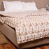 Folded Autumn Vine Pattern Handcrafted Comforter highlighting premium quilting, soft filling, and detailed vine motifs.