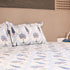 Close-up of Blue Blooming Vines Lattice Cotton Bedding Set showcasing detailed floral motifs, fine stitching, and breathable cotton texture.