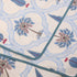 Handcrafted Blue Blooming Vines Lattice Cotton King Size Bedding Set styled on a bed, showcasing coordinated bedsheet, pillow covers, and dohar.