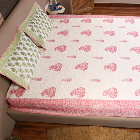 Close-up of Hand Block Print Floral Pattern Bedcover showcasing detailed floral motifs, artisanal block printing, and soft mulmul cotton texture.