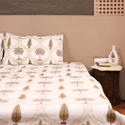 Handcrafted Leaf Lattice Cotton King Size Bedding Set styled on a bed, showcasing coordinated bedsheet, pillow covers, and dohar.