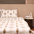 Handcrafted Leaf Lattice Cotton King Size Bedding Set styled on a bed, showcasing coordinated bedsheet, pillow covers, and dohar.