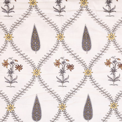 Folded Handcrafted Leaf and Bloom Cotton Bedding Set highlighting premium cotton fabric and intricate botanical floral designs.