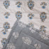 Close-up of Misty Blue Floral Pattern Comforter showcasing intricate floral motifs, quilted stitching, and premium cotton texture.