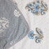 Misty Blue Floral Pattern Double Bed Dohar showcasing delicate floral artwork and handcrafted detailing.