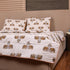 Folded Regal Elephant Caravan Handcrafted Bedcover highlighting premium fabric, vibrant prints, and traditional elephant caravan design.