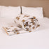 Close-up of Regal Elephant Caravan Comforter showcasing detailed elephant motifs, quilted stitching, and premium cotton texture.