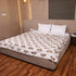 Folded Regal Elephant Caravan Handcrafted Dohar highlighting premium cotton fabric and elegant elephant caravan print.