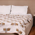Regal Elephant Caravan Double Bed Dohar showcasing intricate elephant procession artwork and handcrafted detailing.