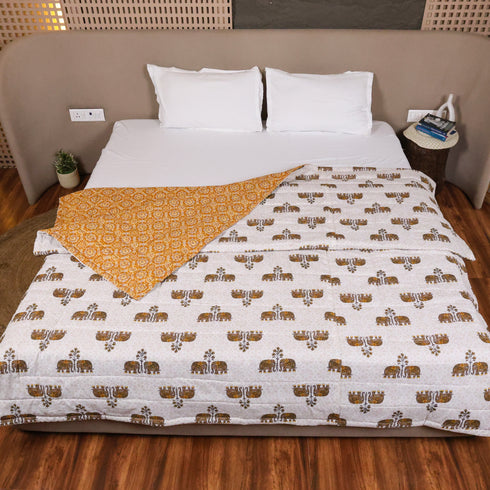 Regal Elephant Caravan Handcrafted Double Bed Comforter crafted from premium cotton with traditional elephant procession motifs, offering warmth, comfort, and timeless bedroom elegance.