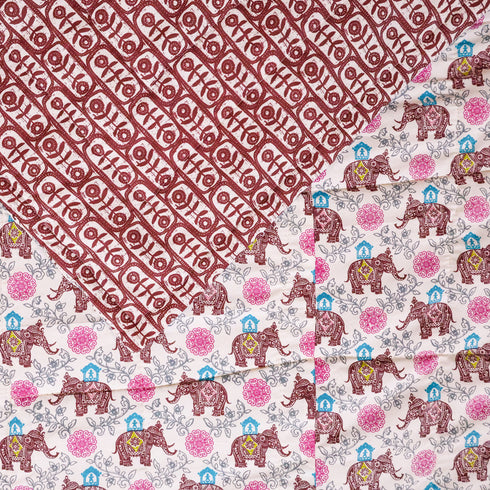 Close-up of Royal Elephant Bloom Comforter showcasing detailed elephant motifs, floral patterns, quilted stitching, and premium cotton texture.