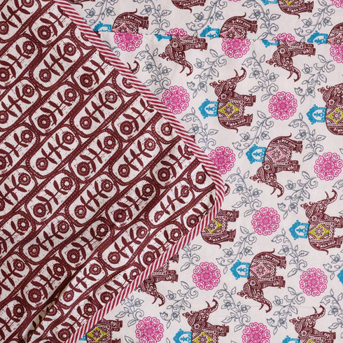 Close-up of Royal Elephant Bloom Double Bed Dohar showcasing soft cotton texture, floral motifs, and heritage-inspired elephant designs.