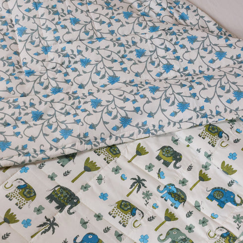 Traditional Elephant Folk Print Comforter styled on a double bed, showcasing heritage-inspired artwork and luxurious comfort.