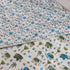 Traditional Elephant Folk Print Comforter styled on a double bed, showcasing heritage-inspired artwork and luxurious comfort.