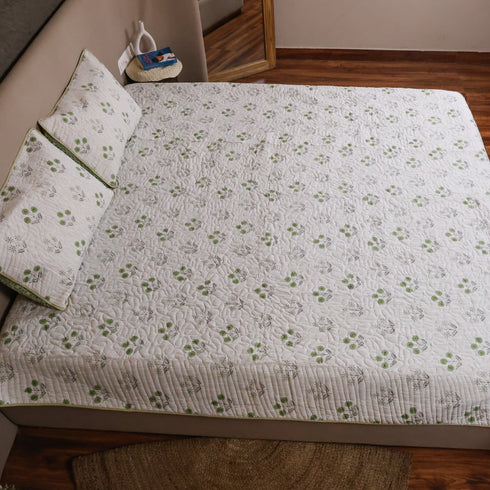Folded Vintage Olive Green Floral Handcrafted Bedcover highlighting premium fabric, soft texture, and detailed floral prints.