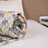Close-up of Yellow Blossom Handcrafted Elephant Comforter highlighting quilted stitching, premium cotton fabric, and detailed handcrafted motifs.