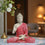 Beige Matte Finish Buddha Statue with Red Robe 
