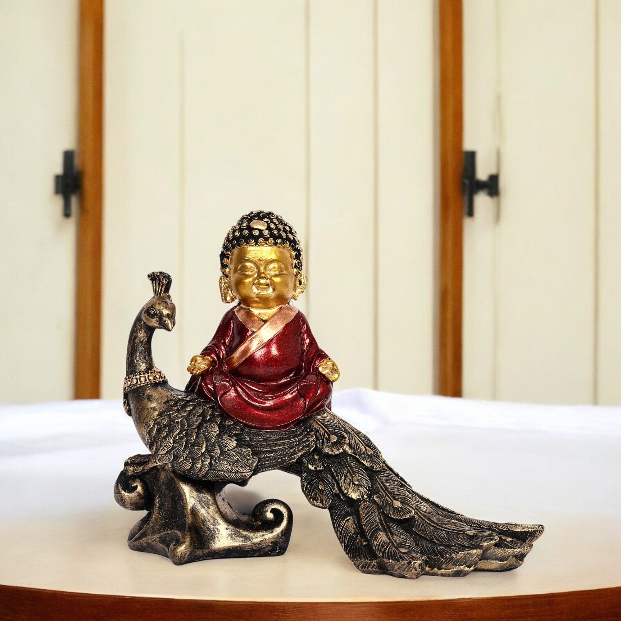Elegant Baby Buddha on Peacock Figurine – Spiritual Home Decor