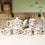 Handcrafted Floral Pattern Ceramic Tea pot Cup set (1 Kettle and 6 cups)