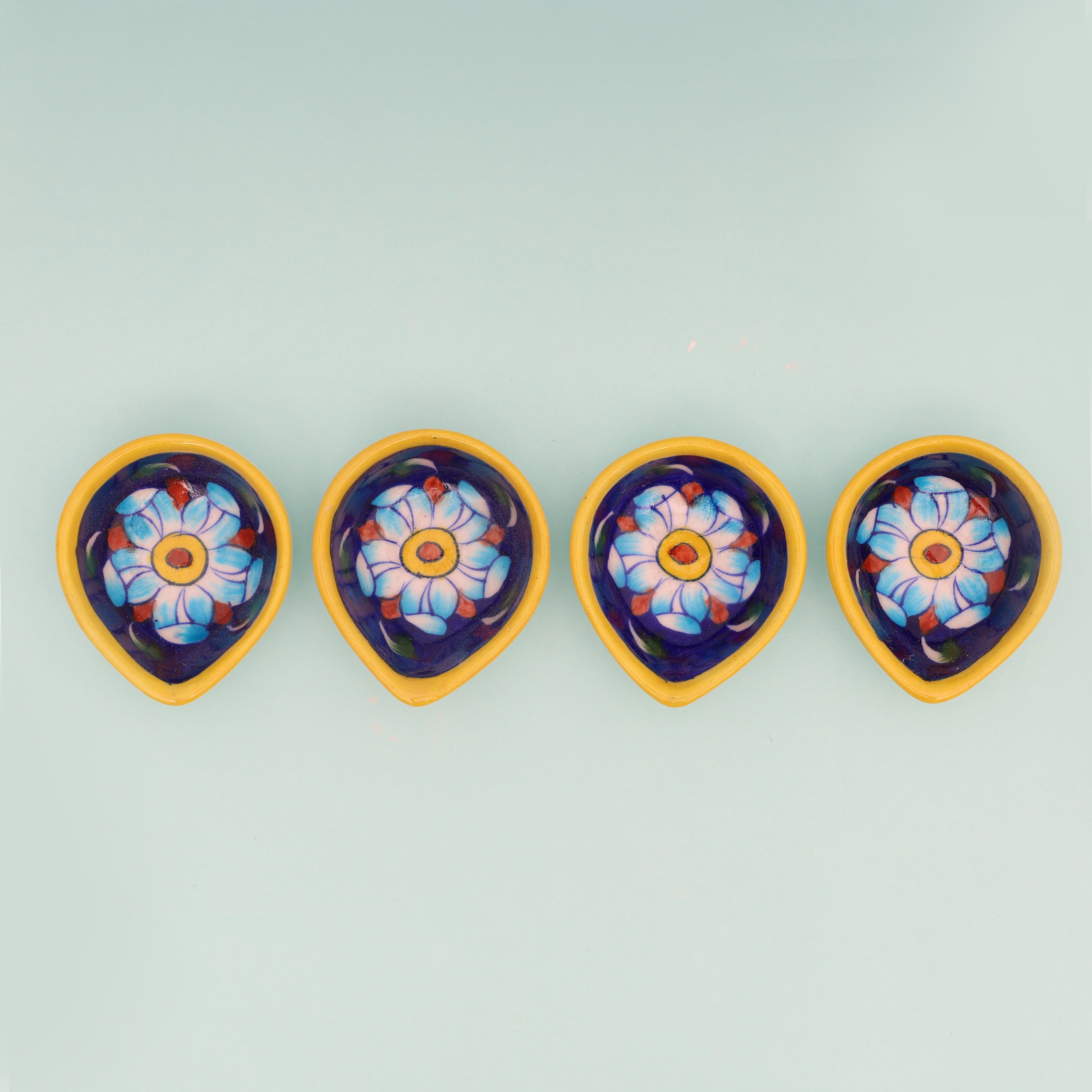 Handcrafted Leaf-Shaped Dual-Tone Blue Pottery Diyas Set 