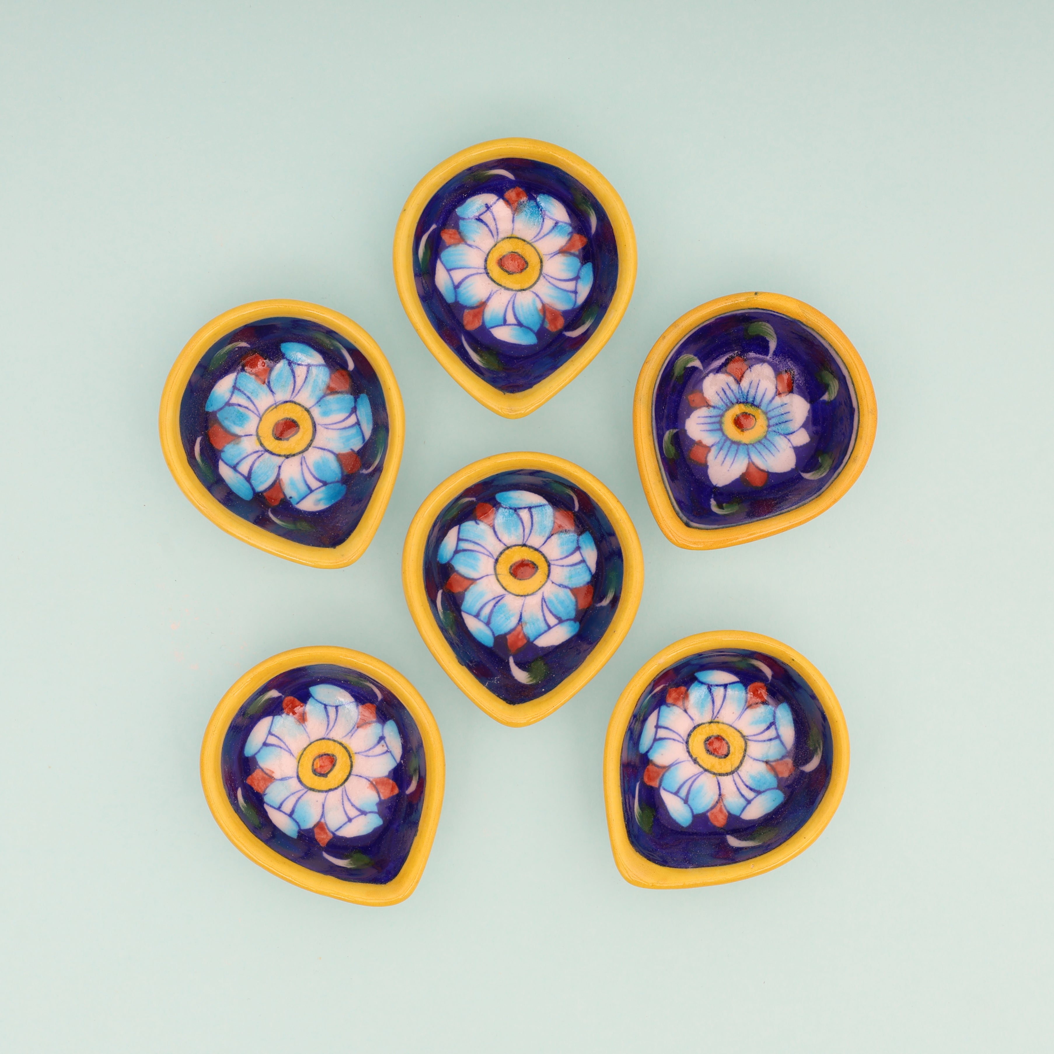 Handcrafted Leaf-Shaped Dual-Tone Blue Pottery Diyas Set 