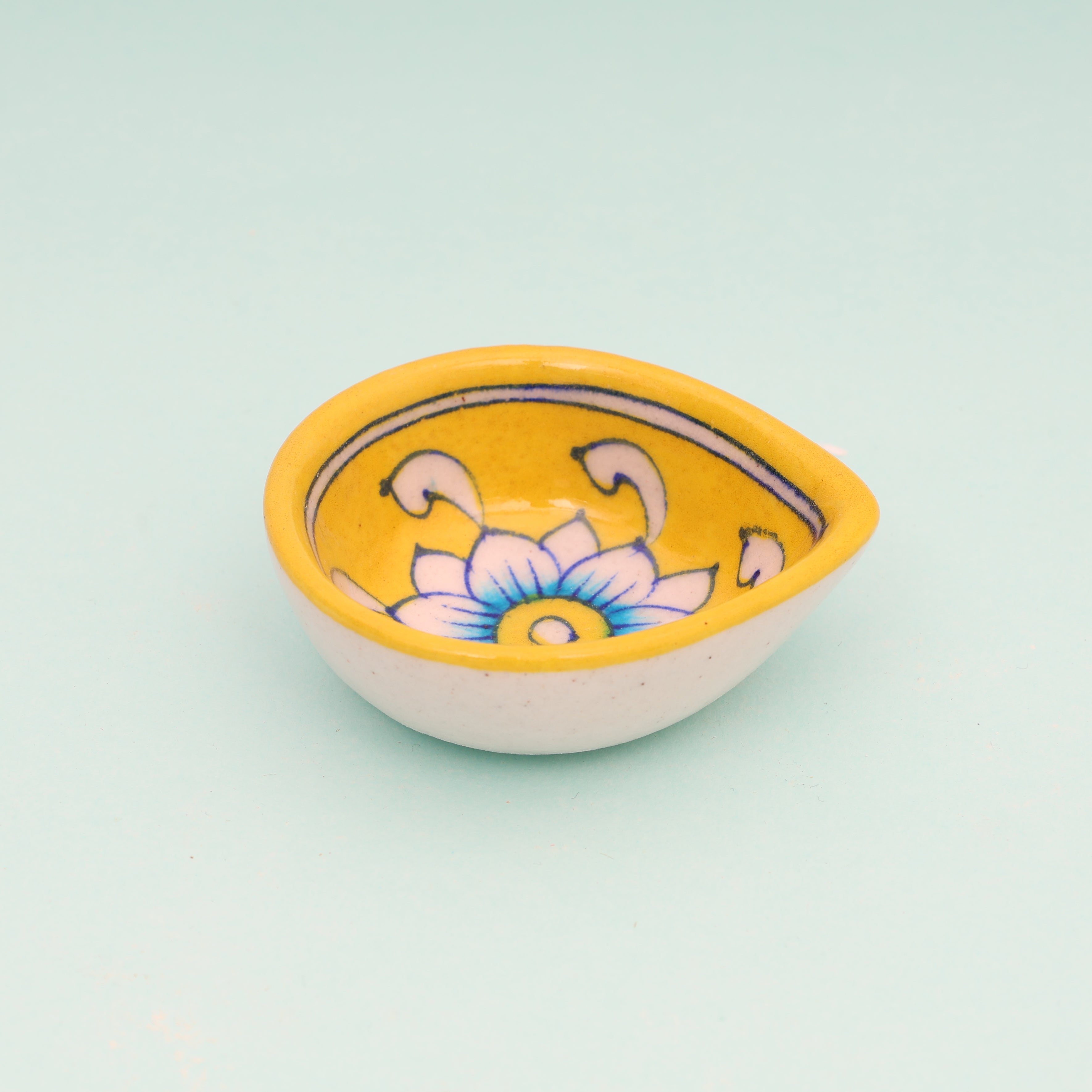 Handcrafted Yellow Leaf-Shaped Blue Pottery Diyas Set